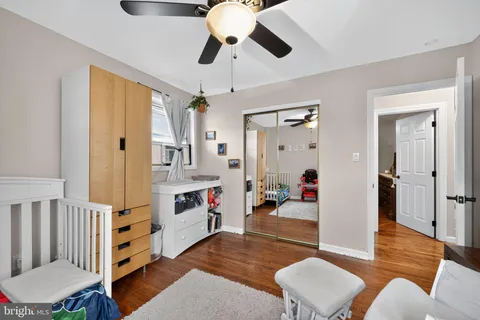a children room with furniture and toys