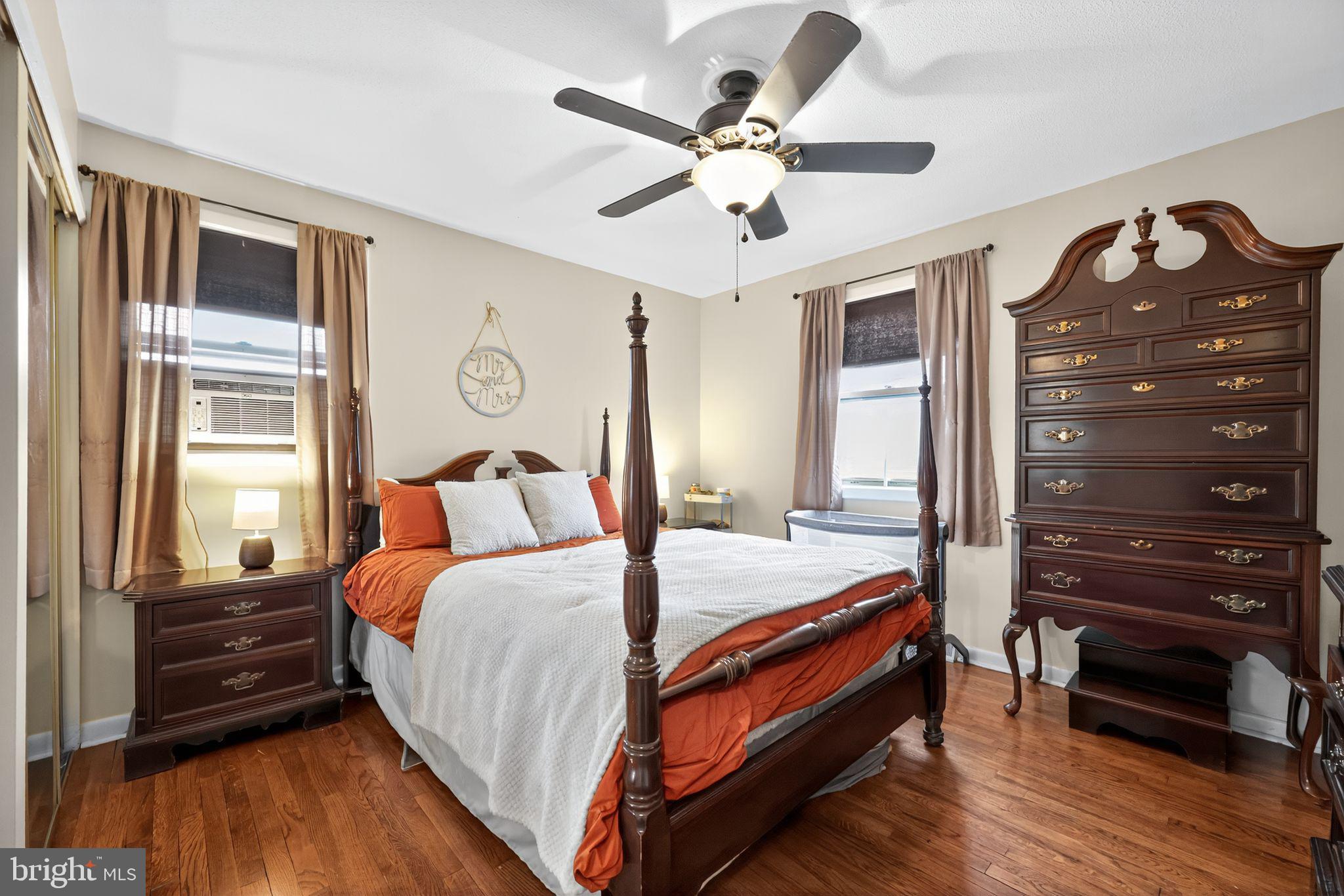 33 Beach Avenue Pennsville, NJ 08070 - Photo 24 of 32 a bed room with a bed and a ceiling fan