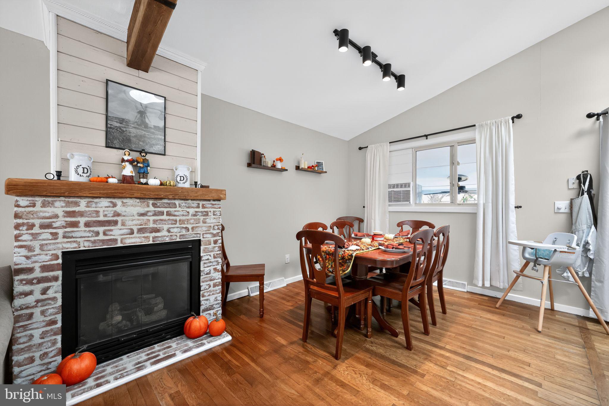 33 Beach Avenue Pennsville, NJ 08070 - Photo 7 of 32 a dining room with furniture and wooden floor