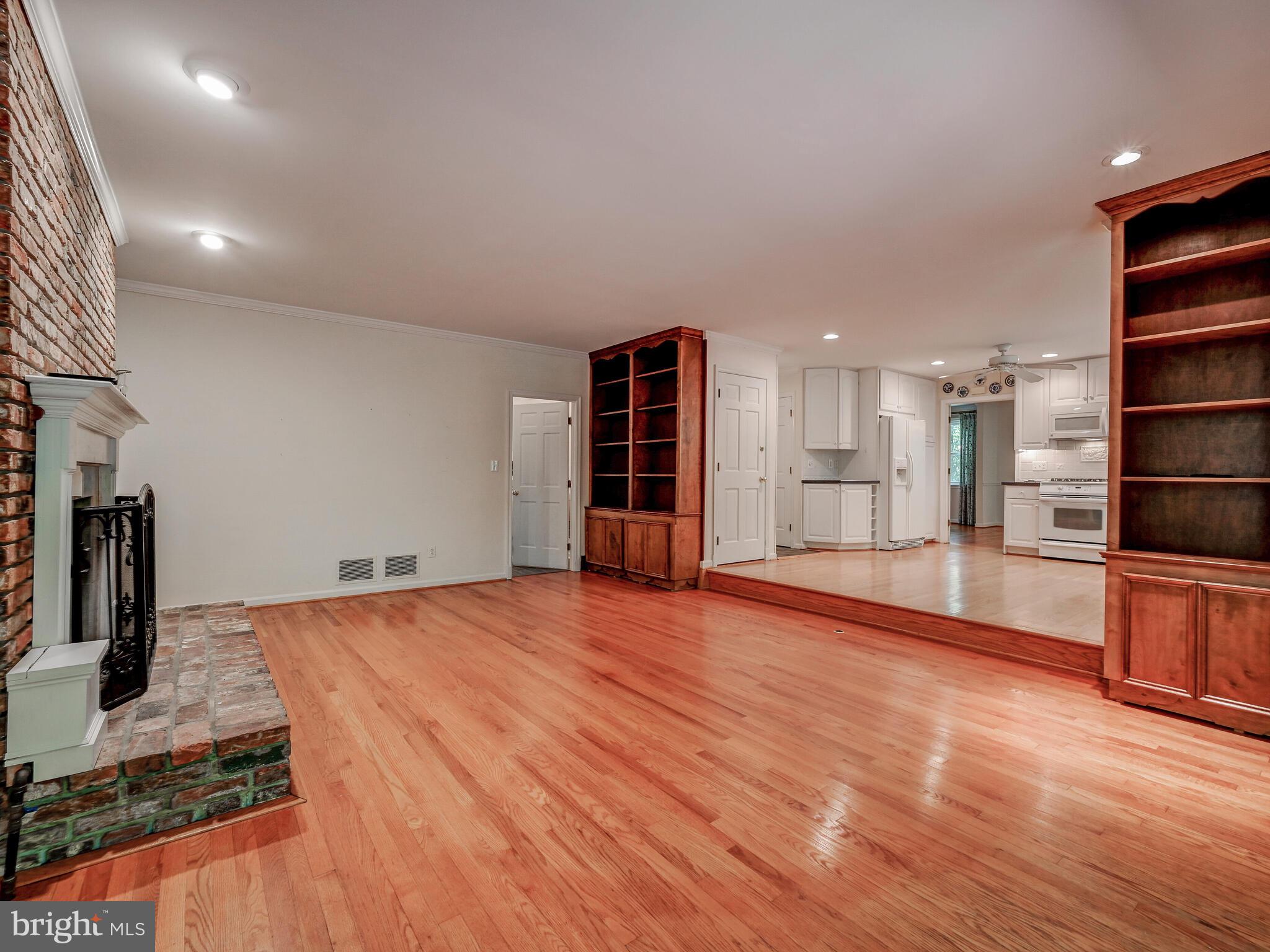 1109 High Country Road Baltimore, MD 21286 - Photo 14 of 43 a view of a kitchen with wooden floor and a sink