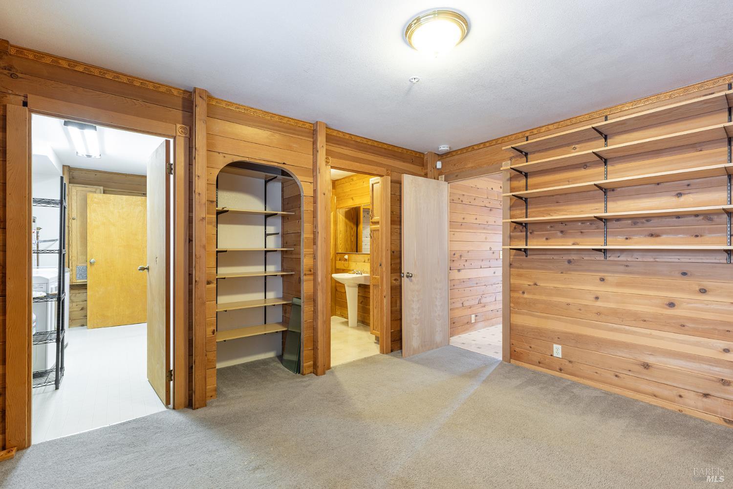 1450 Sproul Avenue Napa, CA 94559 - Photo 26 of 43 a view of walk in closet with clothes and shoes