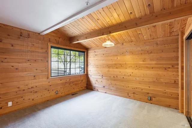 a view of an empty room and window