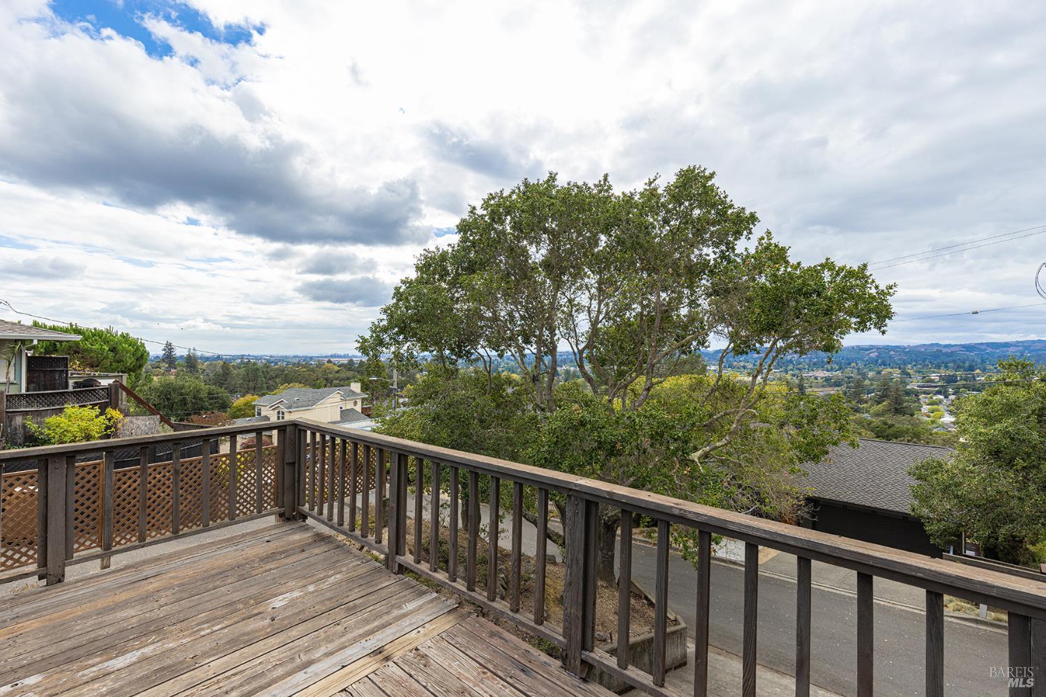 1450 Sproul Avenue Napa, CA 94559 - Photo 32 of 43 a view of a balcony with wooden floor and fence