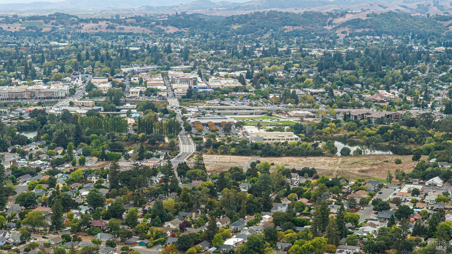 1450 Sproul Avenue Napa, CA 94559 - Photo 41 of 43 an aerial view of residential houses with city and green space