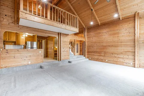 a view of a hallway with an outdoor space