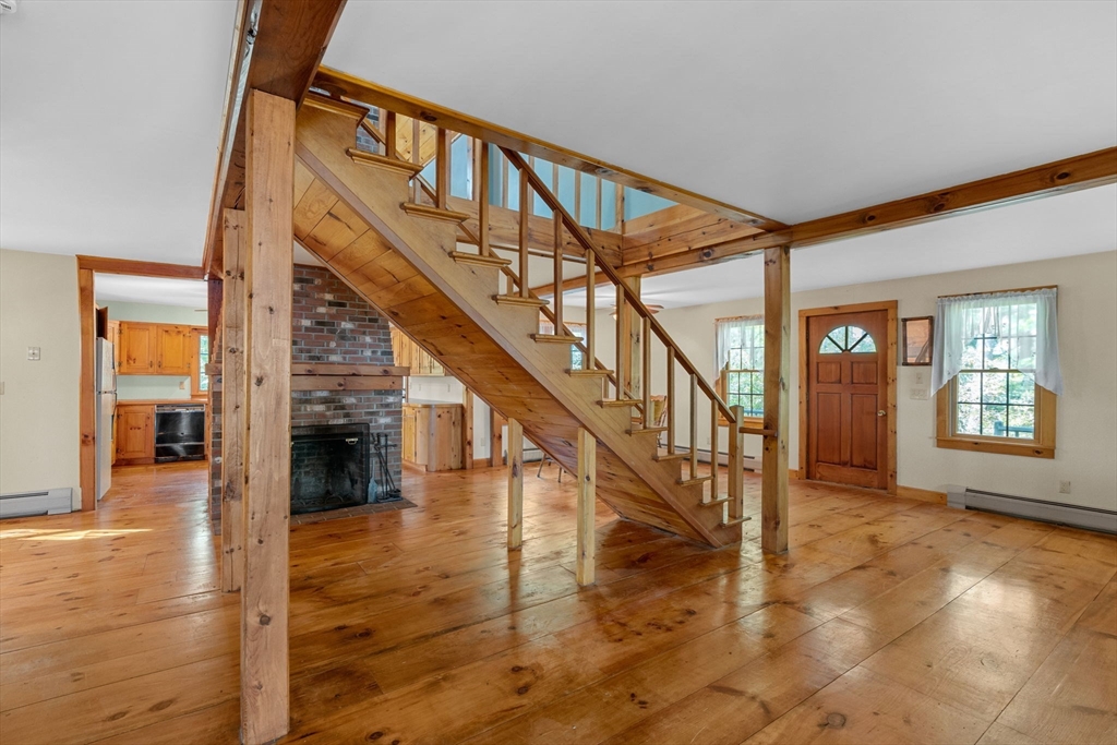 362 Snows Pond Road Rochester, MA 02770 - Photo 4 of 41 a view of entryway and hall with wooden floor