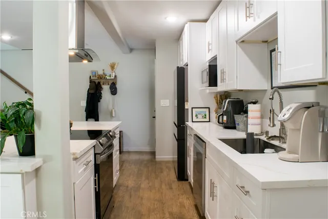 a bedroom with a bed and a desk