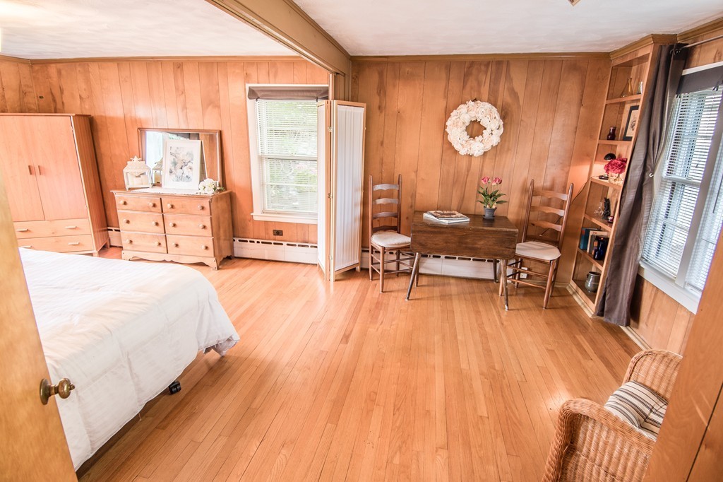 79 Park Street Dedham, MA 02026 - Photo 16 of 29 a living room with furniture and a large window