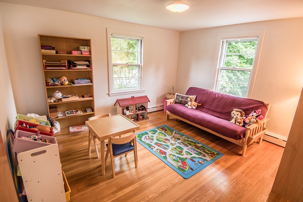 79 Park Street Dedham, MA 02026 - Photo 22 of 29 a living room with furniture and a window