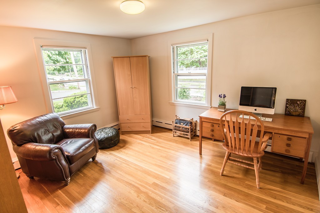 79 Park Street Dedham, MA 02026 - Photo 23 of 29 a living room with furniture and a window