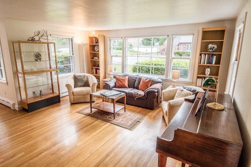 79 Park Street Dedham, MA 02026 - Photo 10 of 29 a living room with furniture and a large window