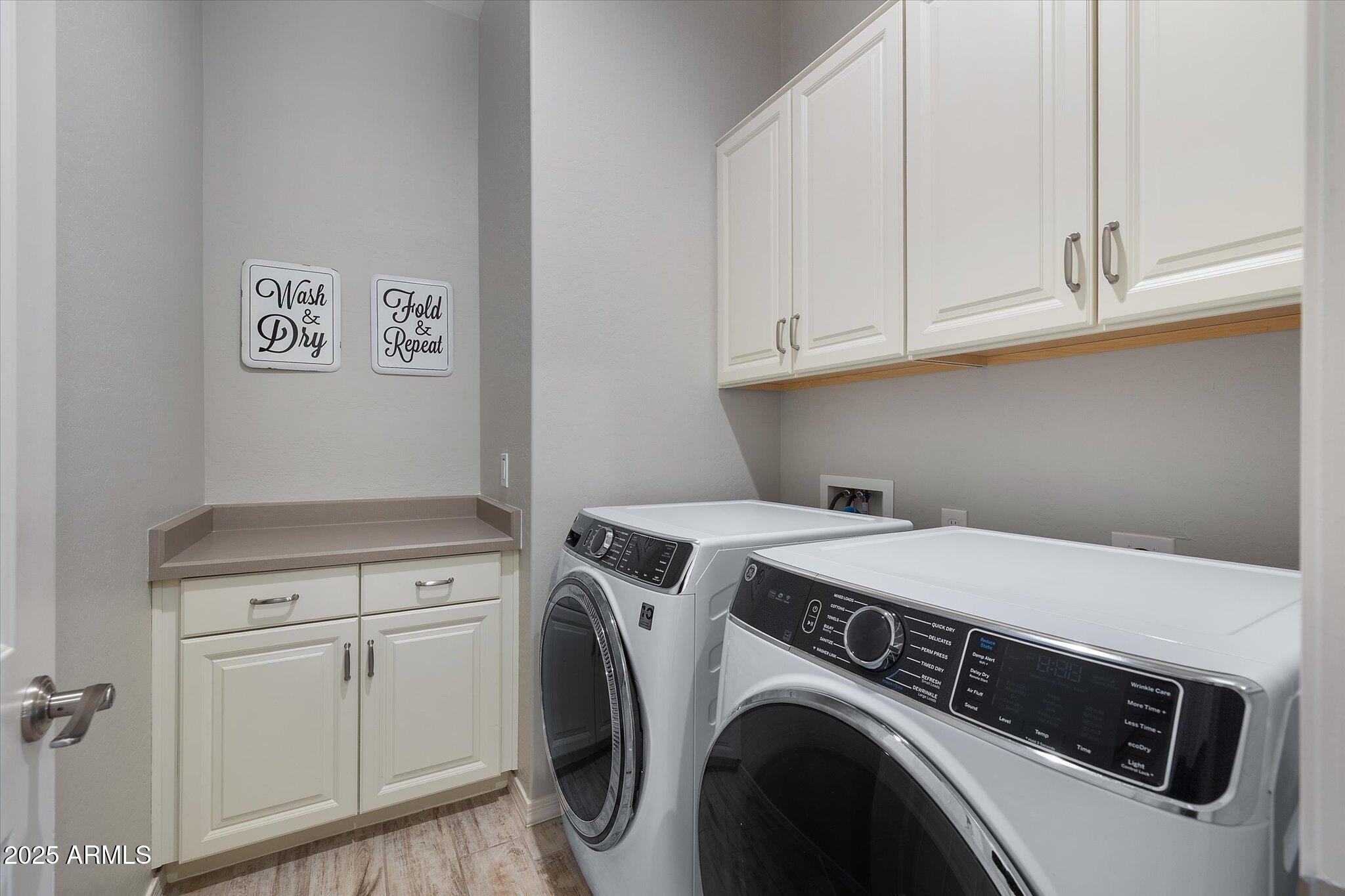 2527 South Quaintance Street Gilbert, AZ 85295 - Photo 17 of 36 a utility room with dryer and washer