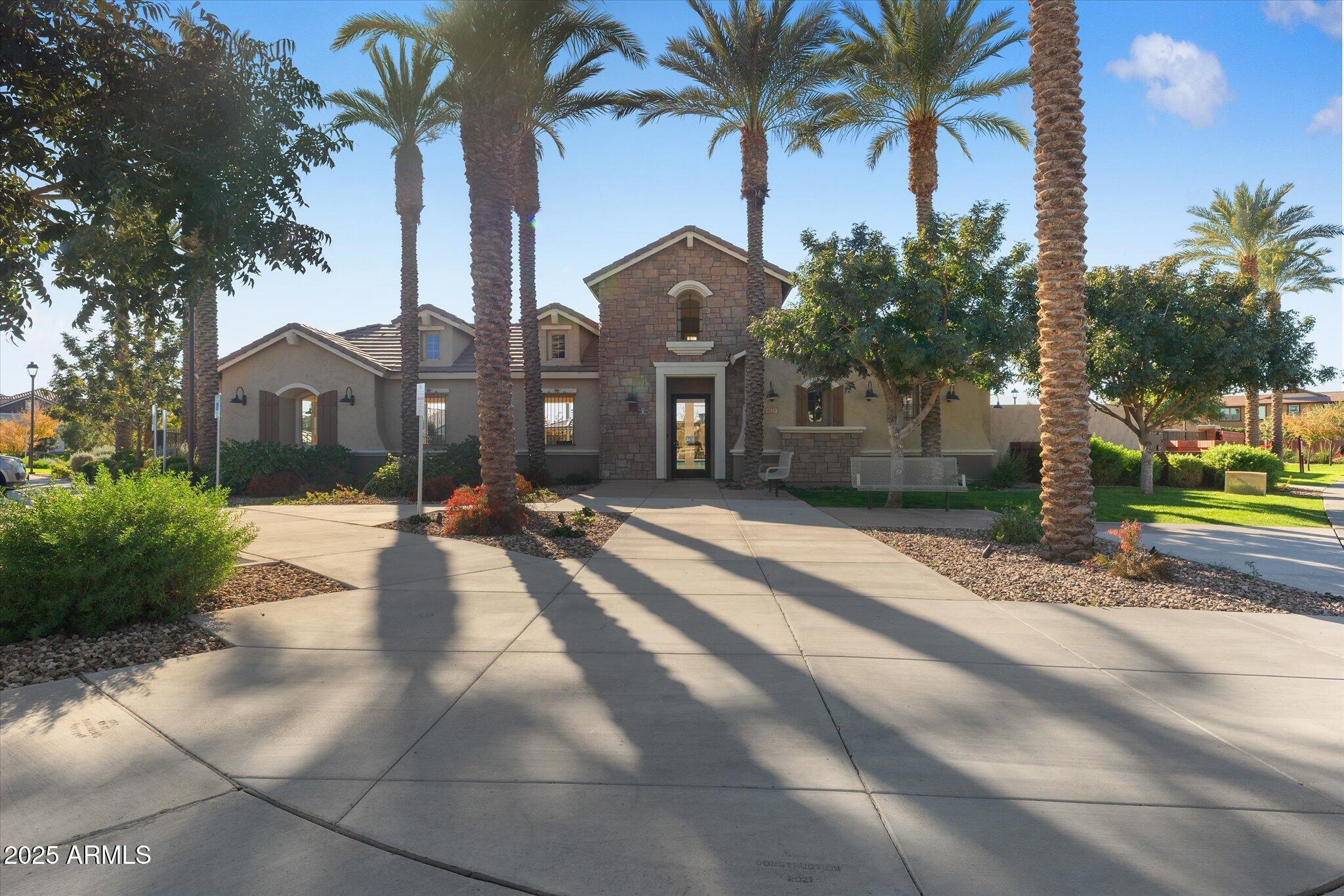 2527 South Quaintance Street Gilbert, AZ 85295 - Photo 25 of 36 a front view of house with yard and green space