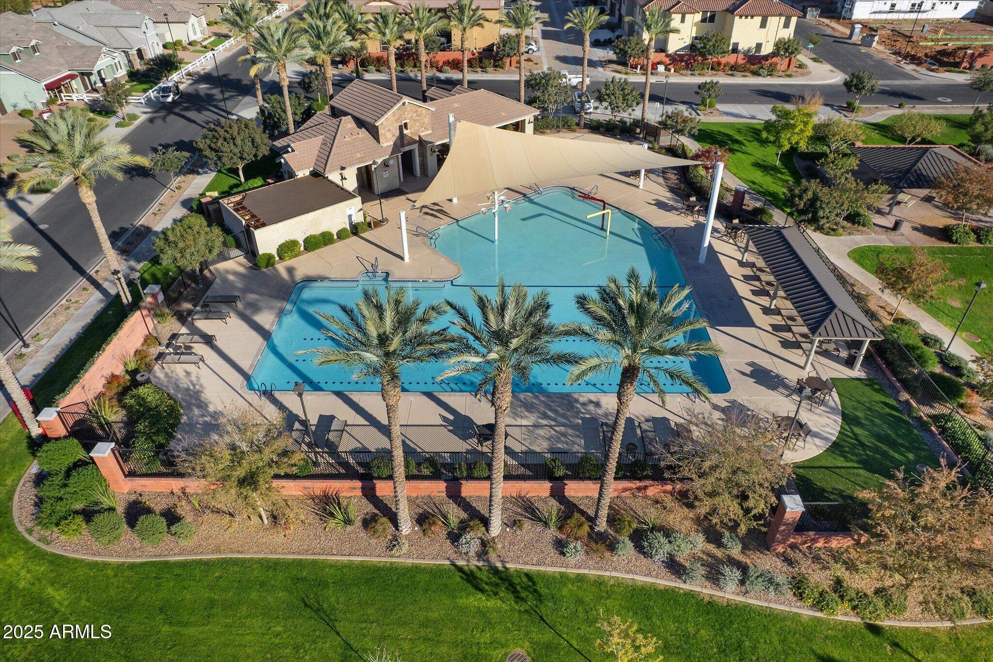 2527 South Quaintance Street Gilbert, AZ 85295 - Photo 27 of 36 an aerial view of a house with a yard and potted plants