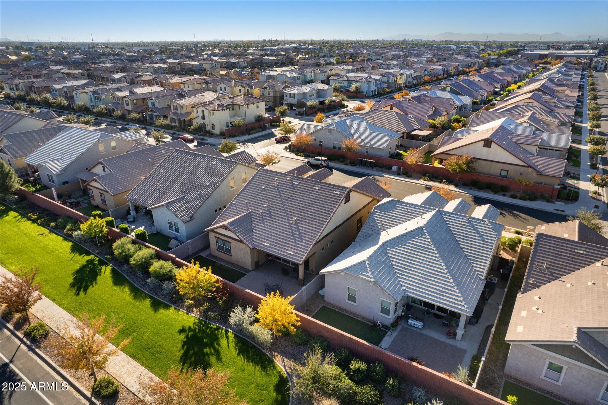 2527 South Quaintance Street Gilbert, AZ 85295 - Photo 31 of 36 an aerial view of a house with a yard