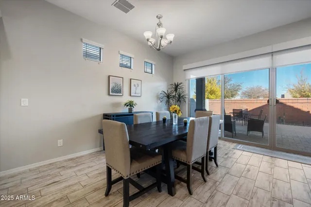 a large white kitchen with a large window