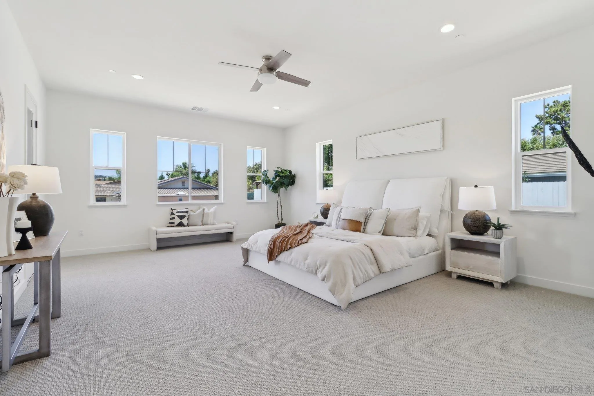 2745 Alexander Drive Escondido, CA 92029 - Photo 15 of 39 a spacious bedroom with a bed and a cabinets