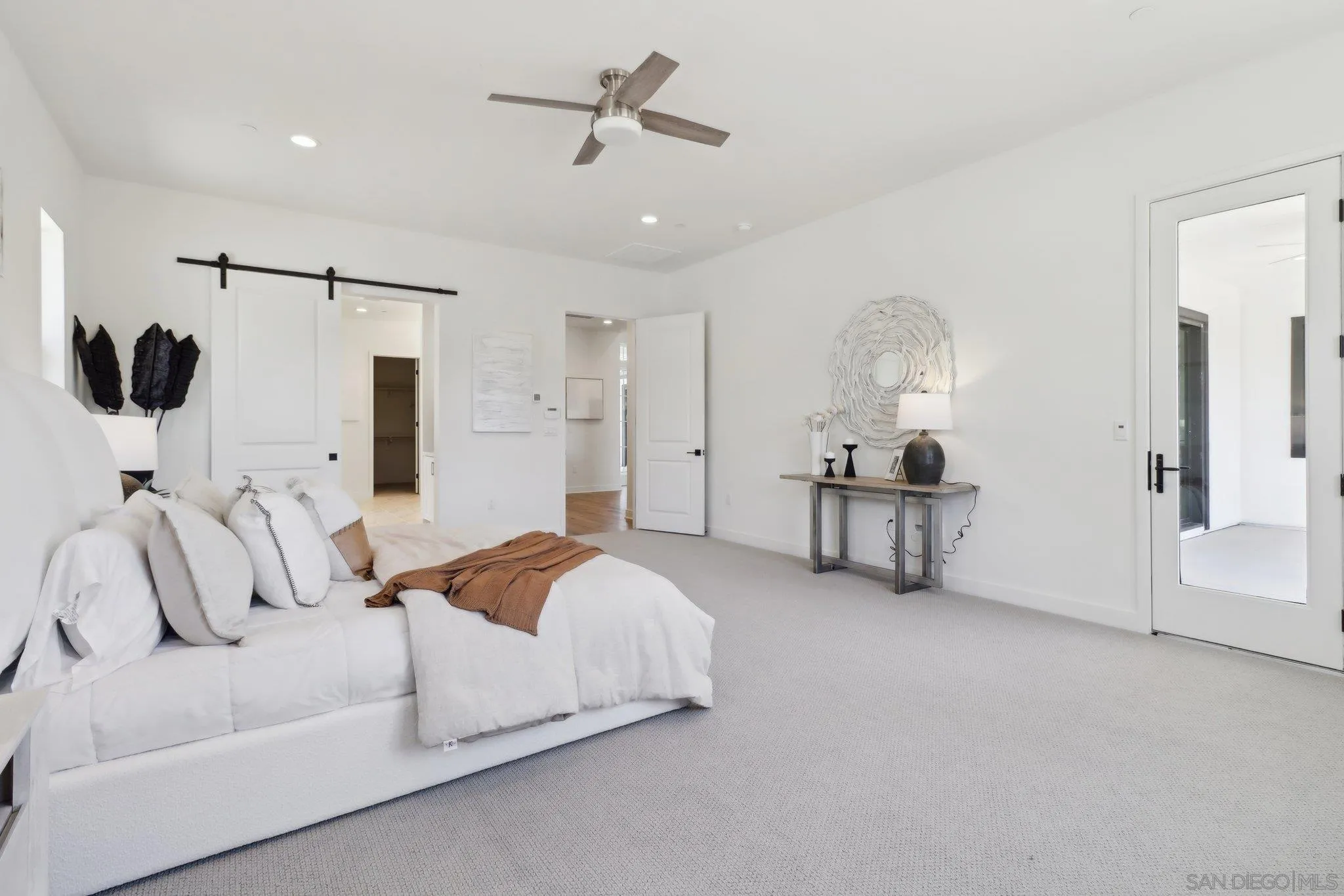 2745 Alexander Drive Escondido, CA 92029 - Photo 17 of 39 a bedroom with bed and ceiling fan