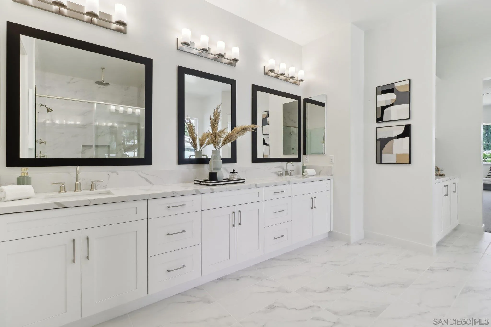 2745 Alexander Drive Escondido, CA 92029 - Photo 22 of 39 a bathroom with double vanity sinks a vanity a lamp and a mirror