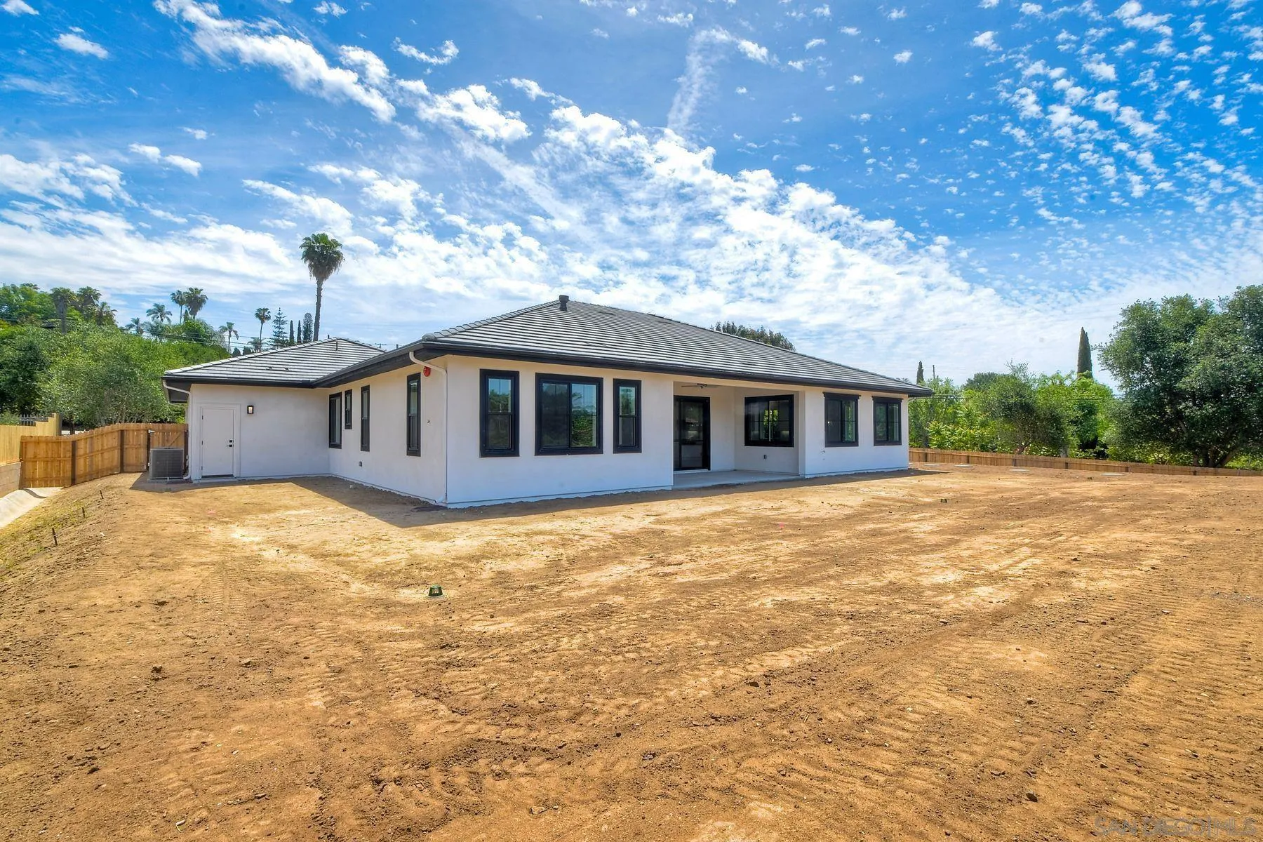 2745 Alexander Drive Escondido, CA 92029 - Photo 27 of 39 a front view of a house with a yard