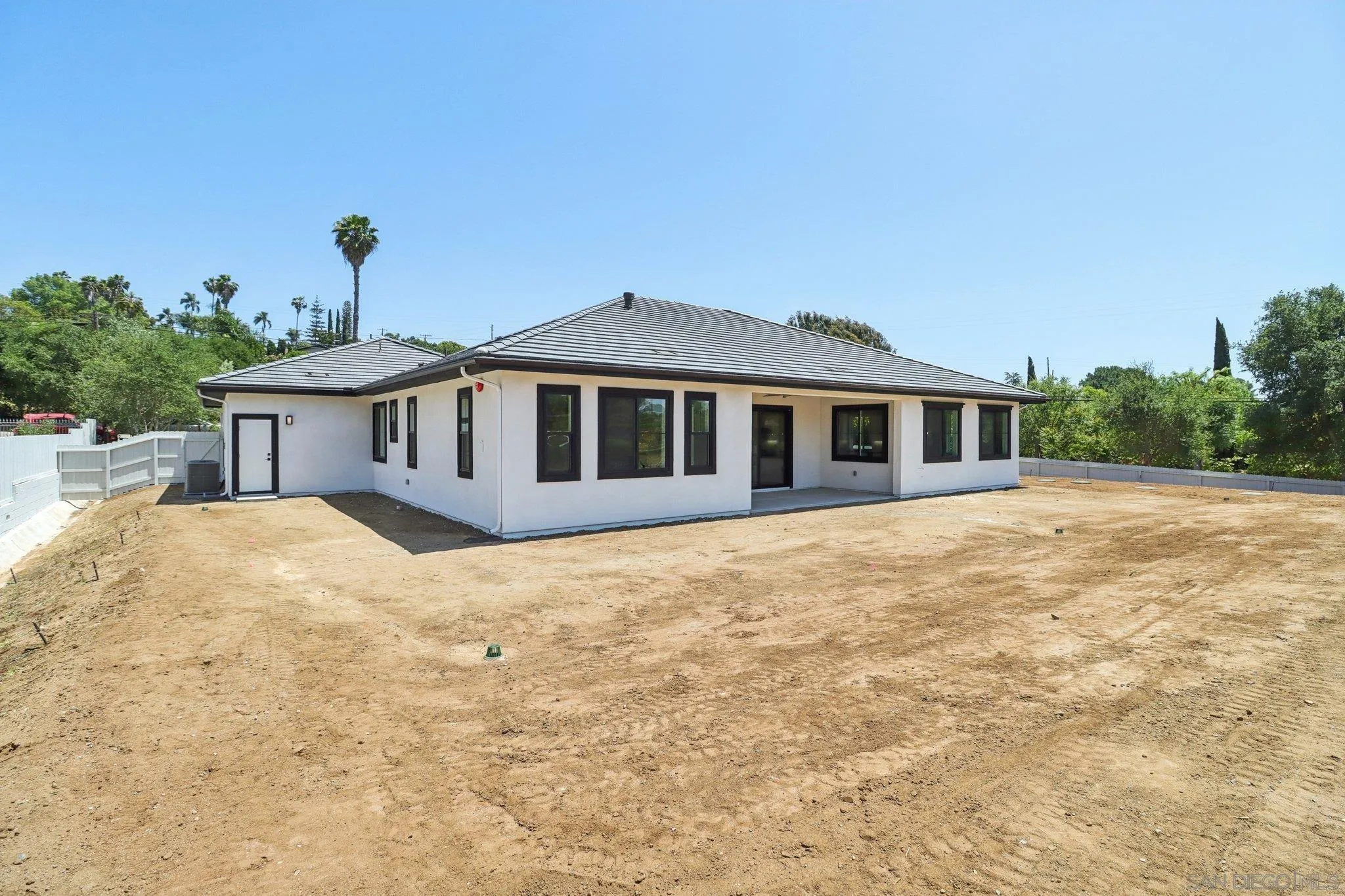 2745 Alexander Drive Escondido, CA 92029 - Photo 30 of 39 a front view of a house with a yard