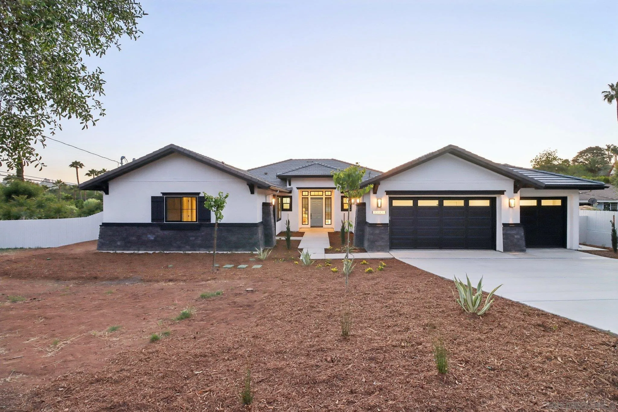 2745 Alexander Drive Escondido, CA 92029 - Photo 32 of 39 a front view of a house with a yard