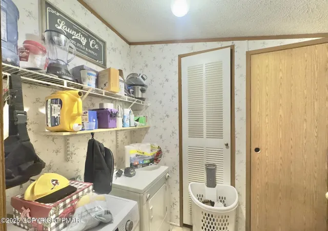 a bathroom with a toilet a sink and a shower