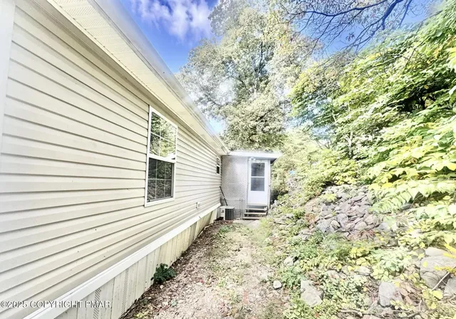 a house view with a backyard space