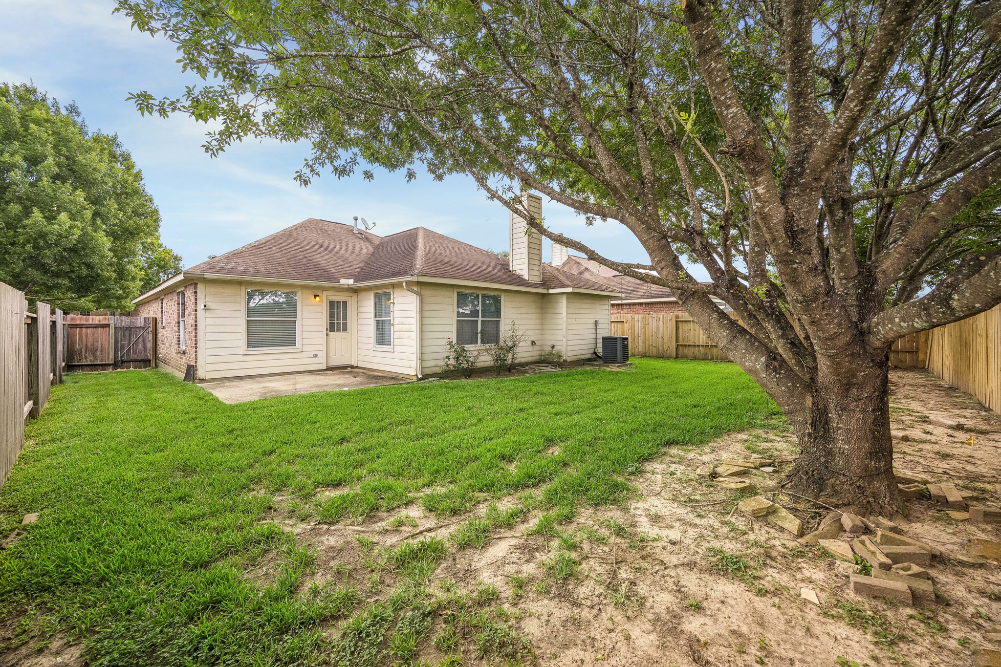 24027 Floragate Drive Spring, TX 77373 - Photo 20 of 21 a front view of a house with a yard
