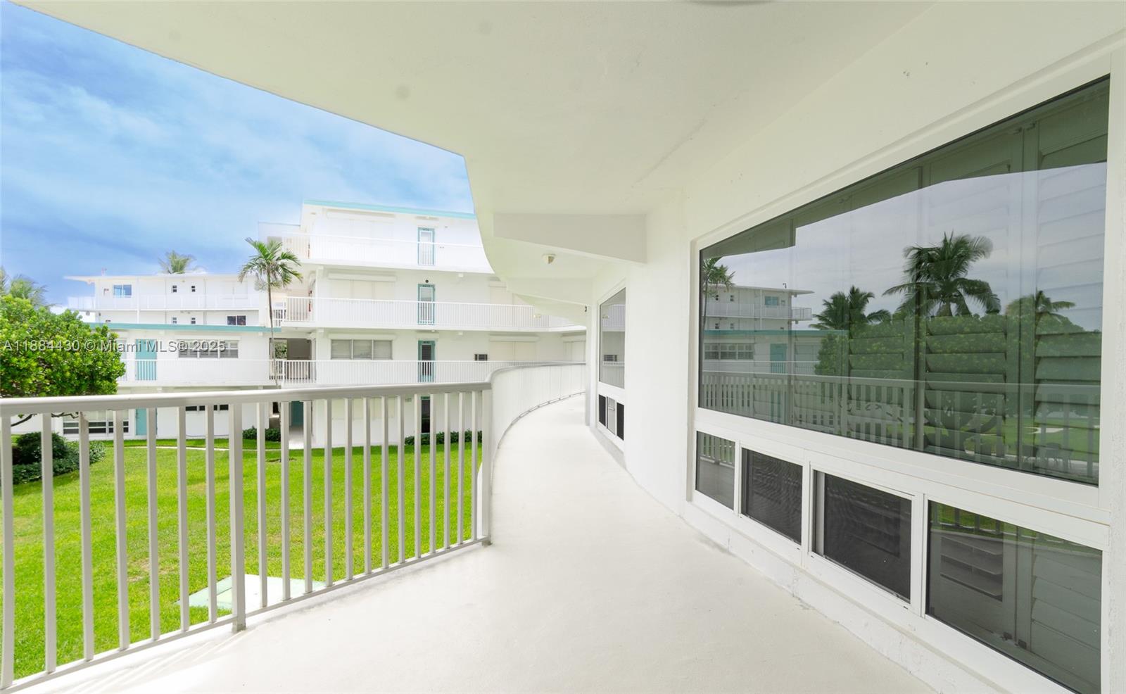 1470 South Ocean Boulevard, Unit 702 Pompano Beach, FL 33062 - Photo 14 of 15 a view of a building from a balcony