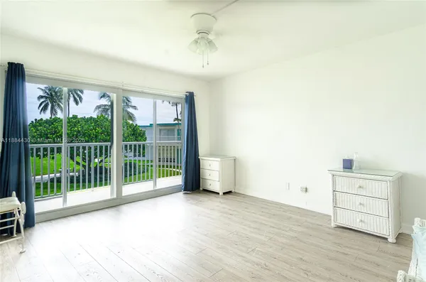 a view of livingroom with furniture wooden floor and window
