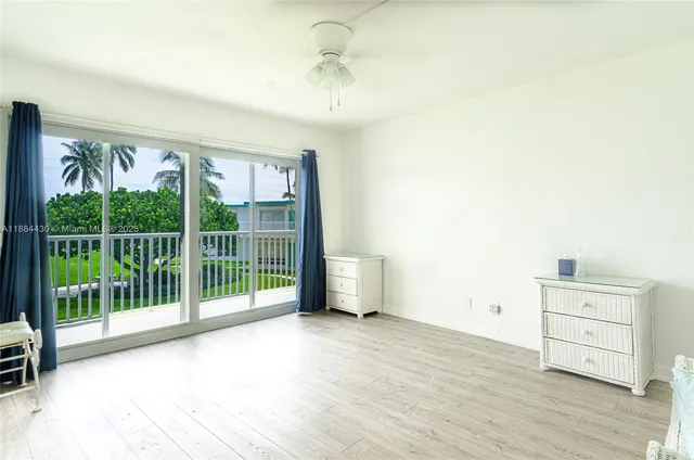 a view of livingroom with furniture wooden floor and window