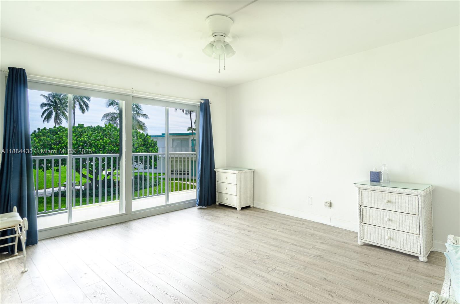 1470 South Ocean Boulevard, Unit 702 Pompano Beach, FL 33062 - Photo 8 of 15 a view of livingroom with furniture wooden floor and window