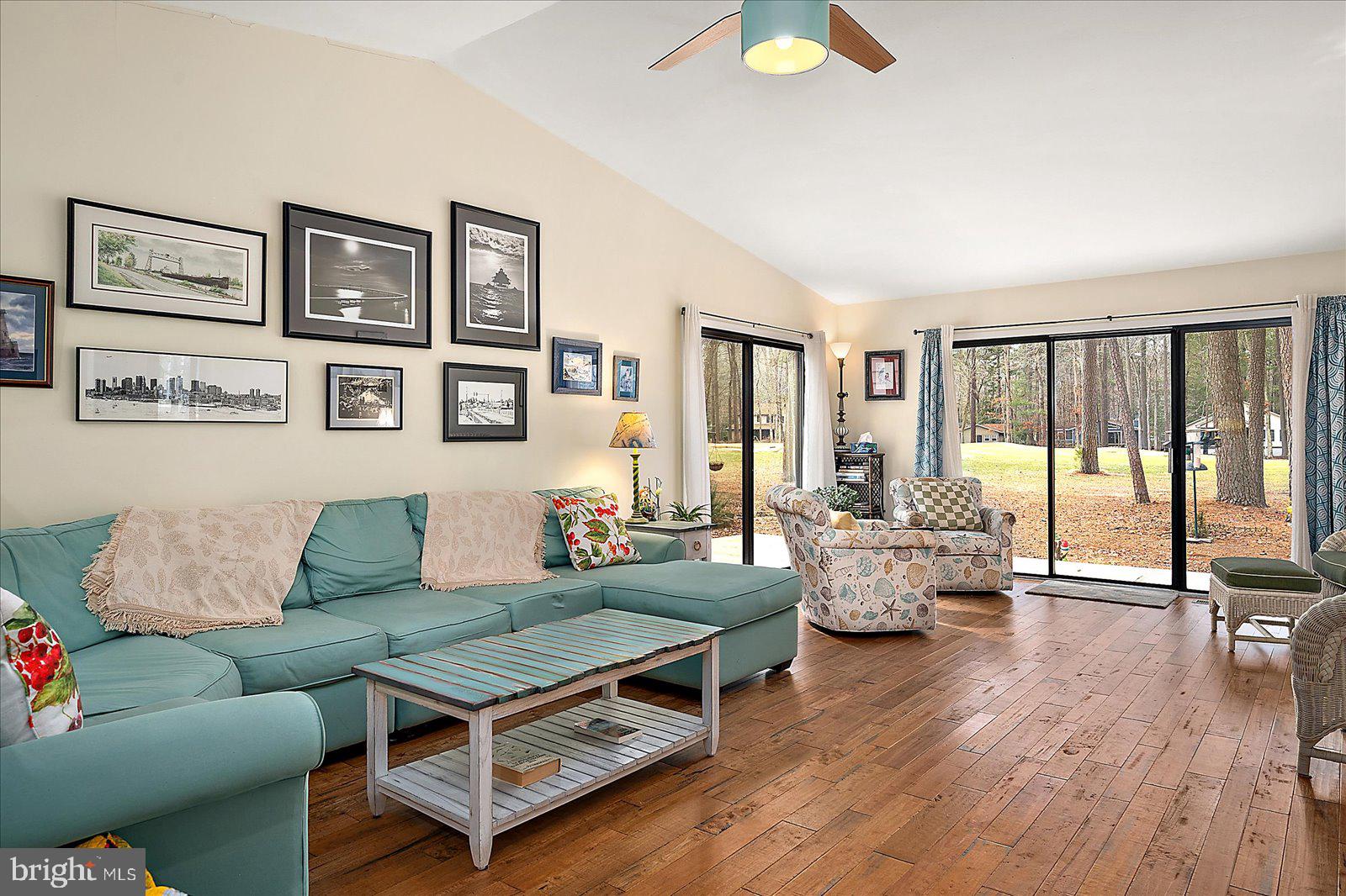 21 Drawbridge Road Ocean Pines, MD 21811 - Photo 3 of 103 a living room with furniture and wooden floor