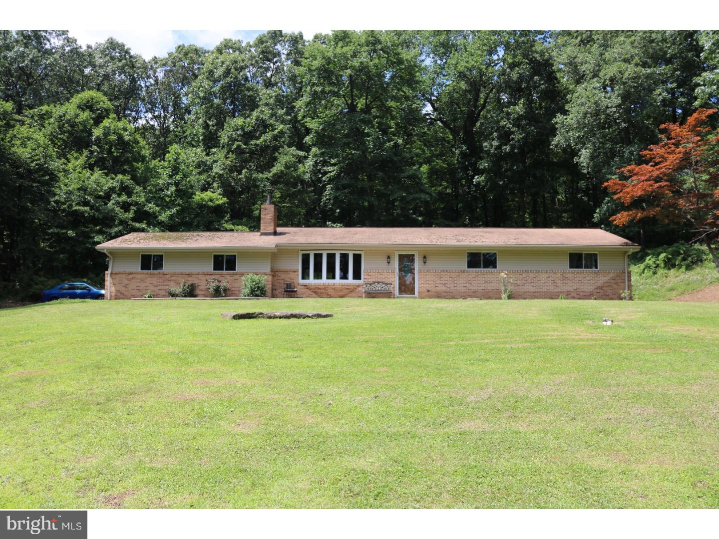 2571 Welsh Road Mohnton, PA 19540 - Photo 1 of 23 a aerial view of a house with a yard table and chairs