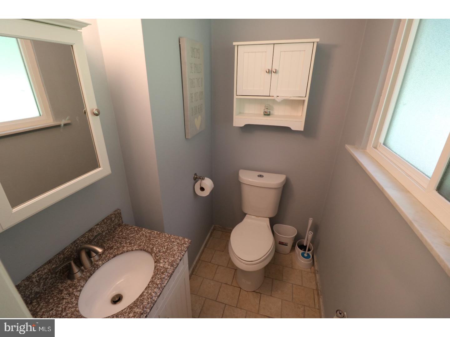 2571 Welsh Road Mohnton, PA 19540 - Photo 17 of 23 a bathroom with a toilet sink and mirror