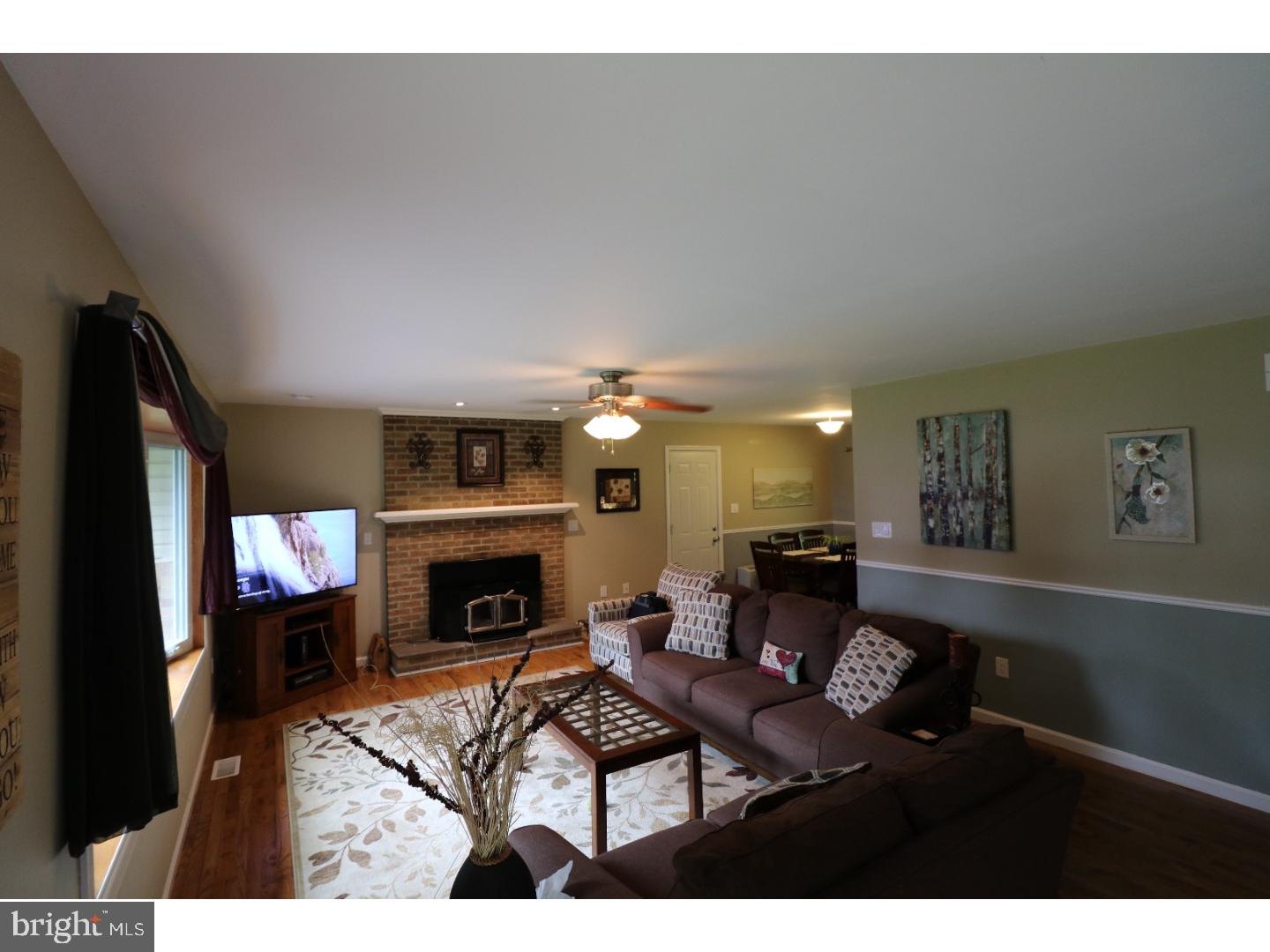 2571 Welsh Road Mohnton, PA 19540 - Photo 4 of 23 a living room with furniture and a fireplace