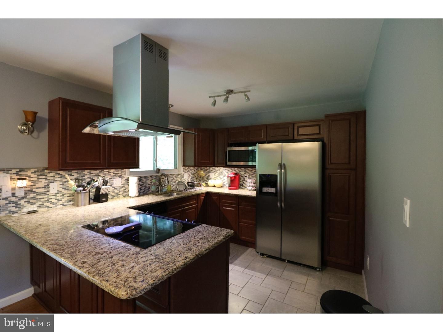 2571 Welsh Road Mohnton, PA 19540 - Photo 6 of 23 a kitchen with refrigerator and cabinets