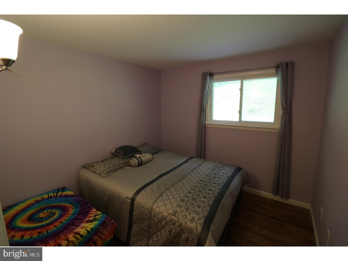 2571 Welsh Road Mohnton, PA 19540 - Photo 10 of 23 a bedroom with a bed and a window