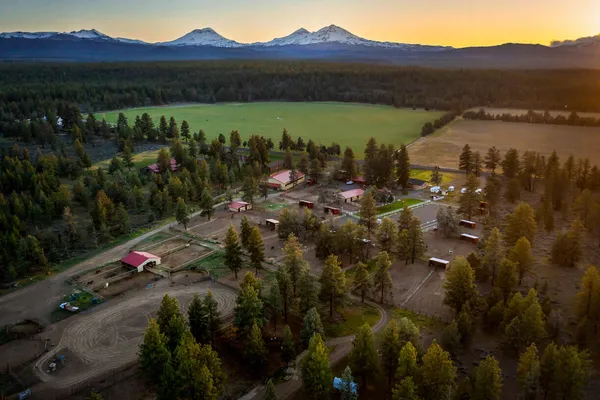 a view of a town with mountains in the background