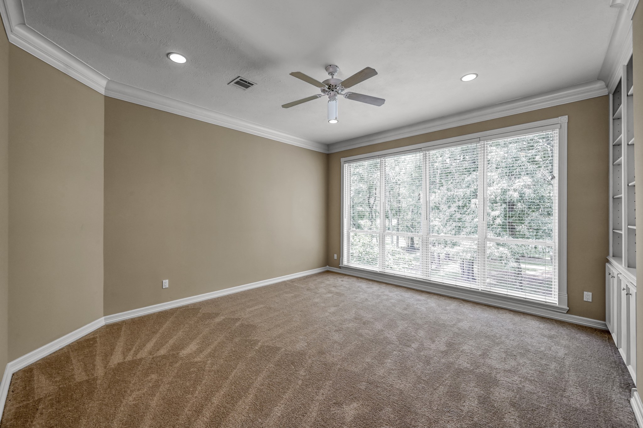 2205 Longmire Road Conroe, TX 77304 - Photo 26 of 49 Game room located upstairs with an abundance of natural light.