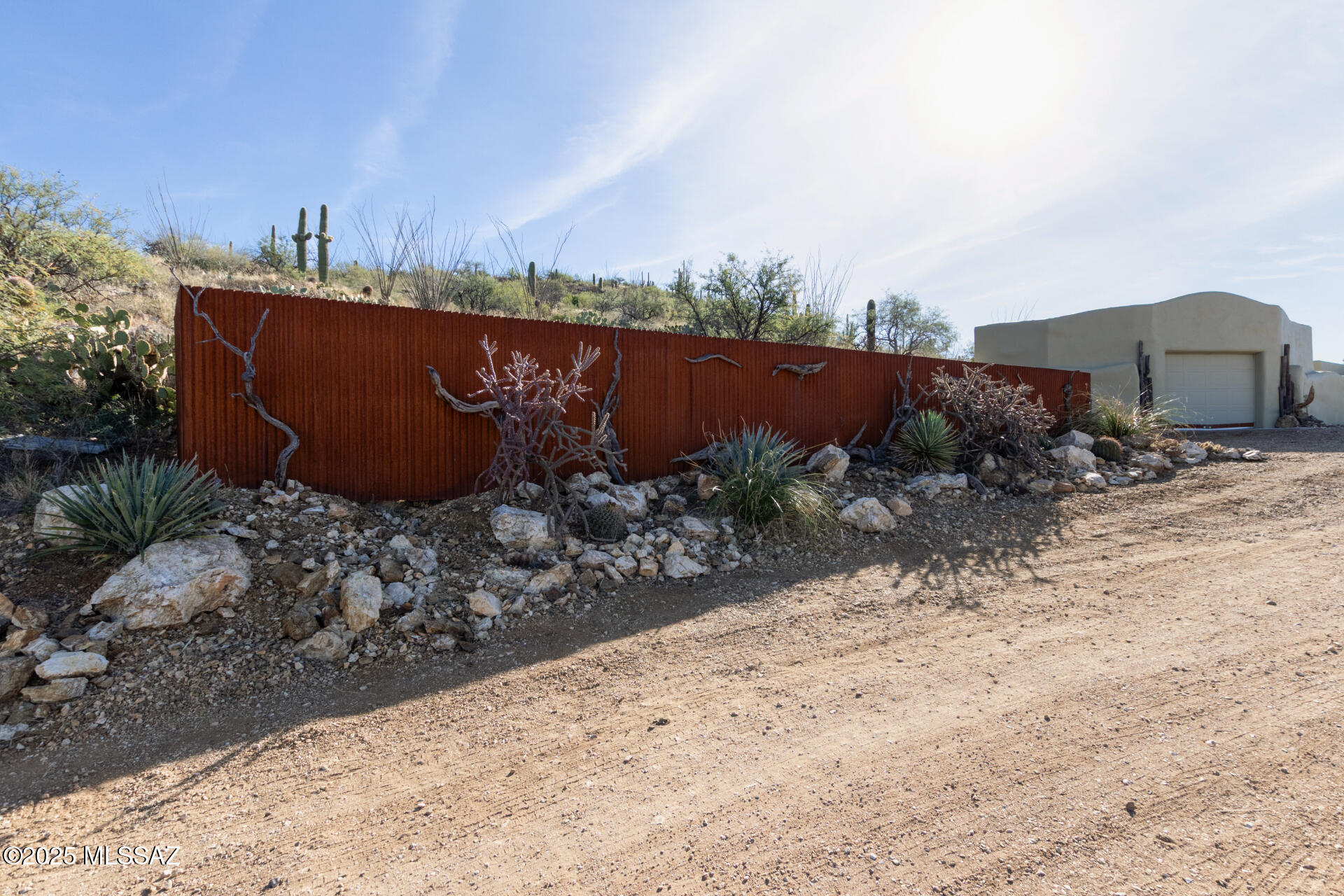 8491 South Pistol Hill Road Vail, AZ 85641 - Photo 39 of 50 Rock Garden with custom fencing behind