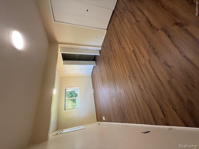 43038 Hanford Road Canton, MI 48187 - Photo 29 of 36 Spacious room featuring wood-finish flooring, neutral-toned walls, and recessed lighting