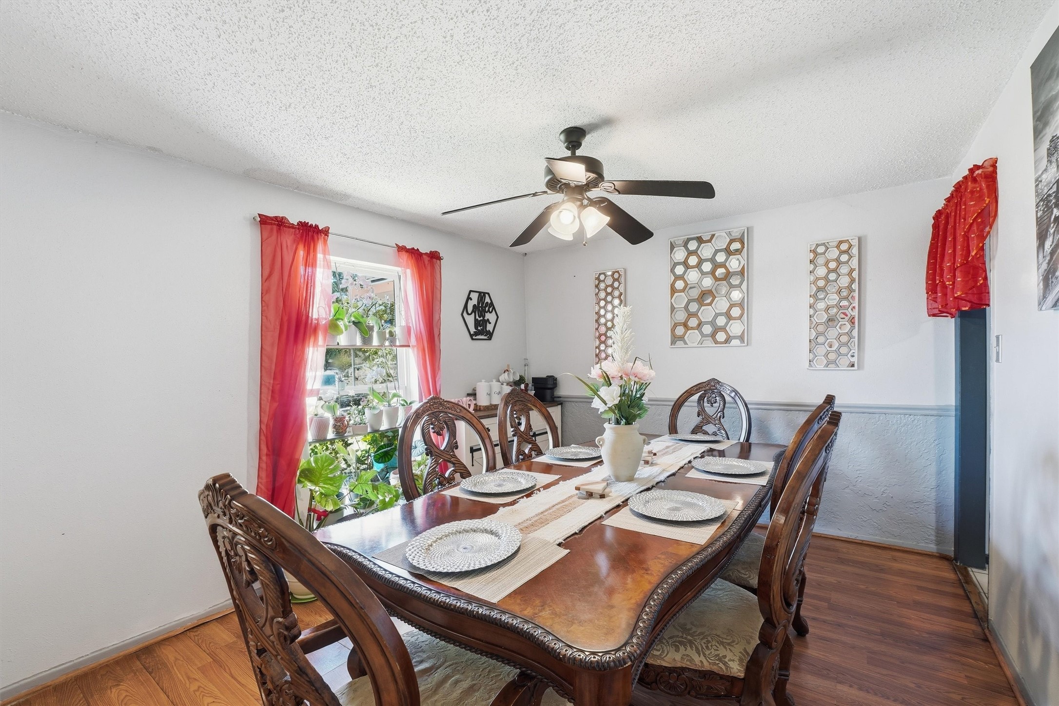 6203 Sunnygate Drive Spring, TX 77373 - Photo 5 of 23 a view of a dining room with furniture and wooden floor