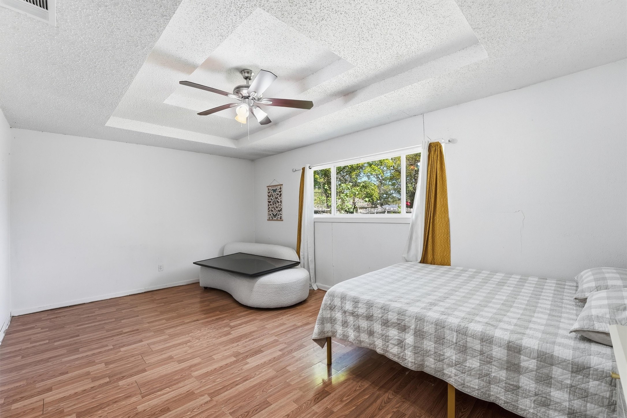 6203 Sunnygate Drive Spring, TX 77373 - Photo 9 of 23 a bedroom with a bed and a window