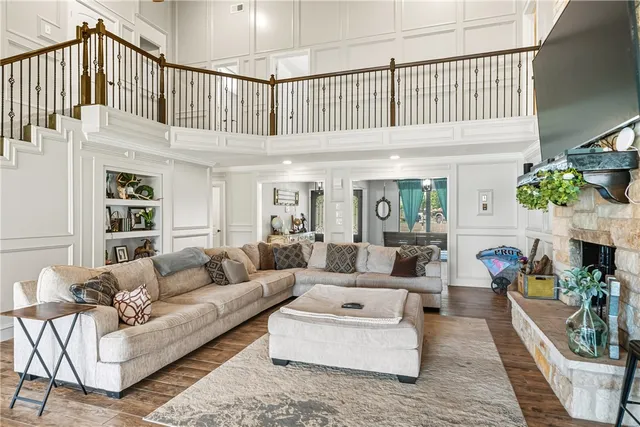 a spacious bathroom with a tub sink and shower