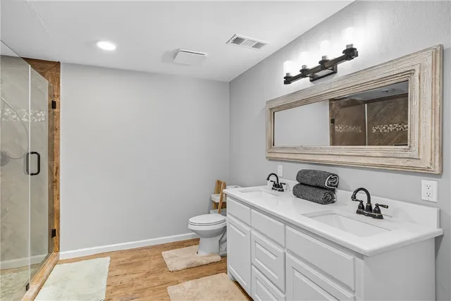 a spacious bedroom with a bed and closet