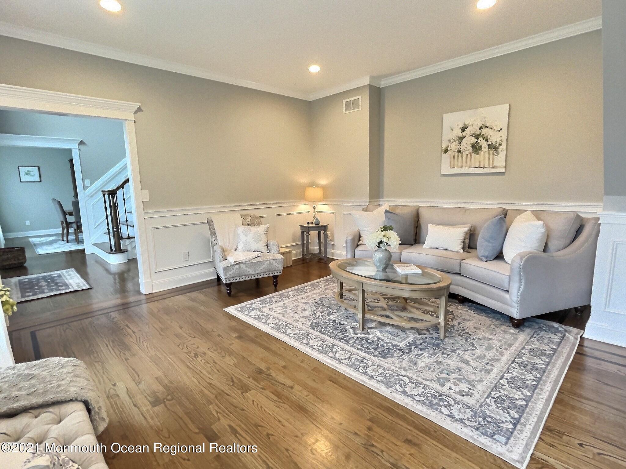 21 Dearborn Drive Holmdel, NJ 07733 - Photo 11 of 48 a living room with furniture and a rug
