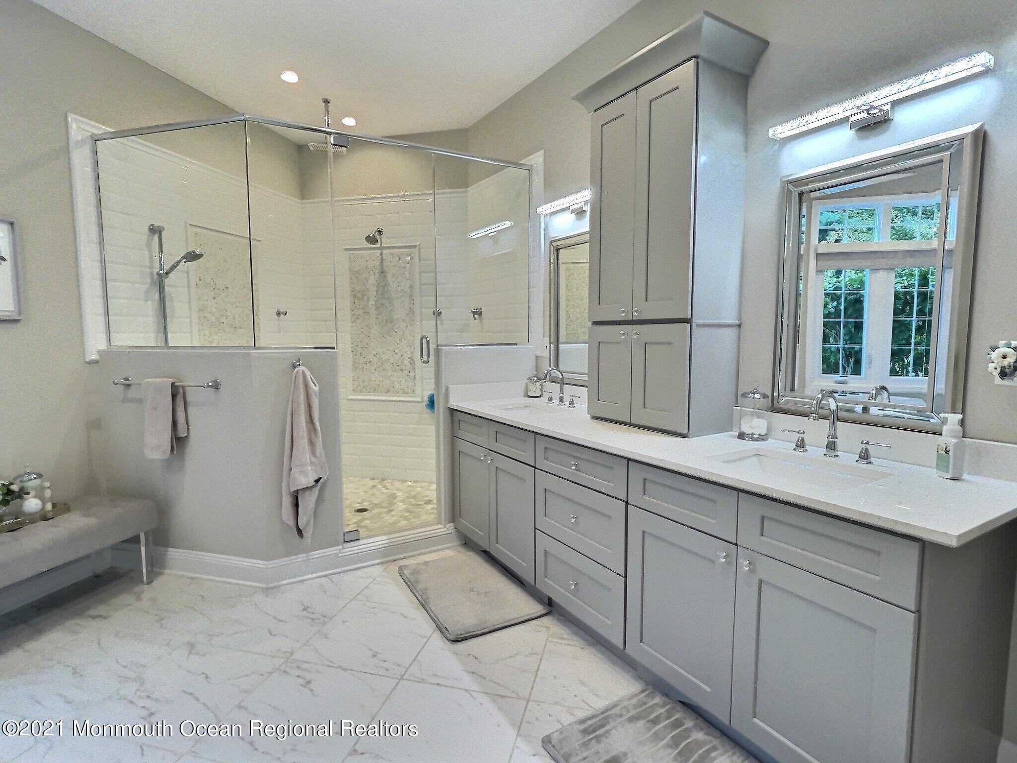 21 Dearborn Drive Holmdel, NJ 07733 - Photo 16 of 48 a spacious bathroom with a double vanity sink mirror and double