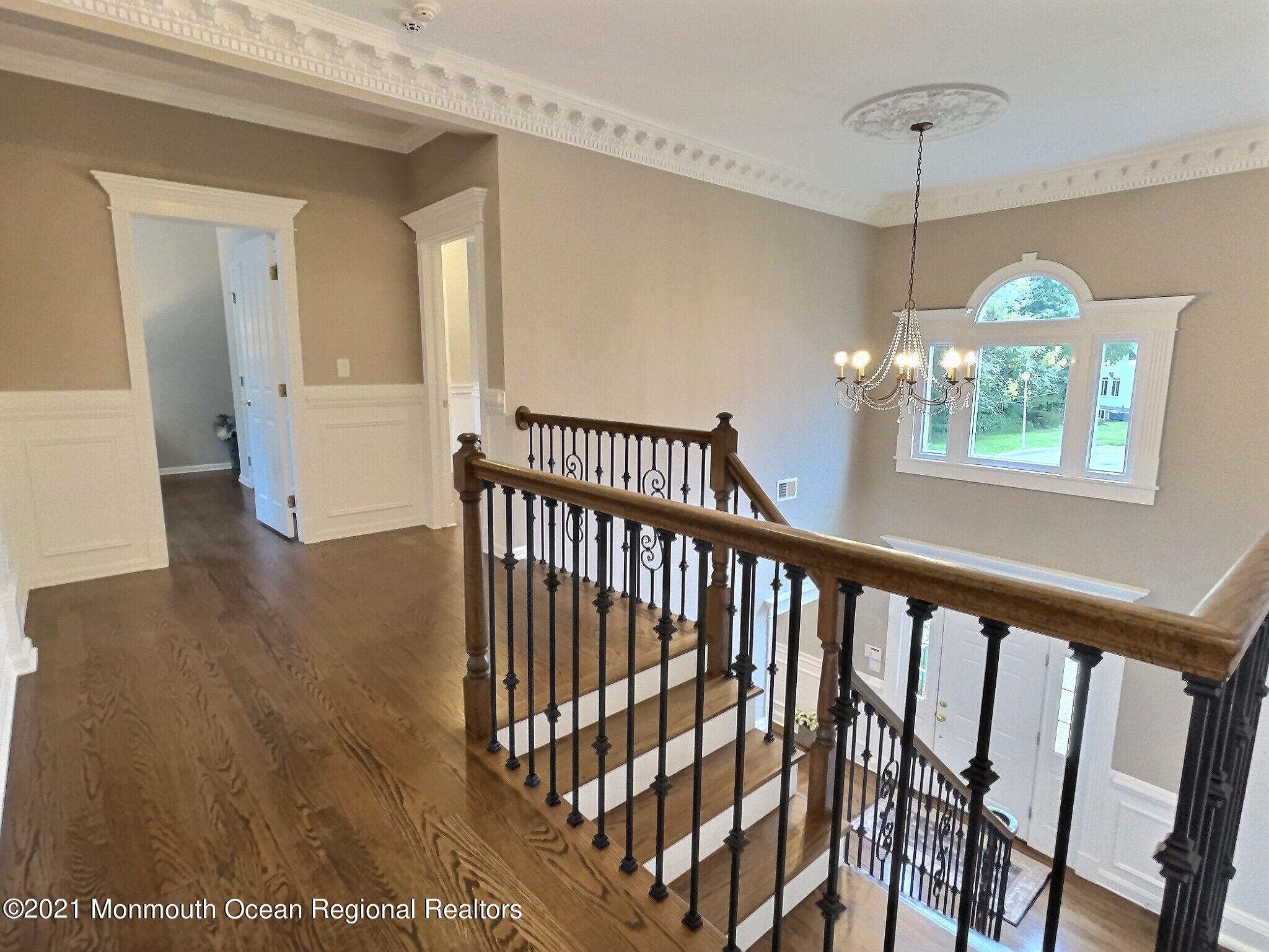 21 Dearborn Drive Holmdel, NJ 07733 - Photo 19 of 48 a view of entryway with wooden floor